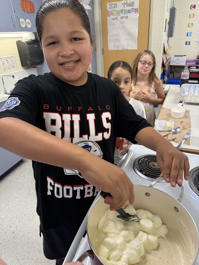 Students stirring pot