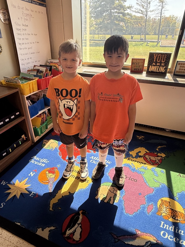 ES students in orange shirts