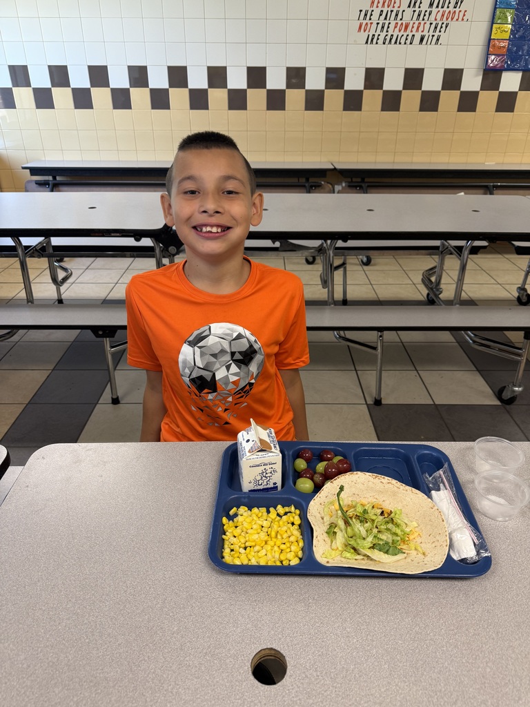 Es student in orange shirt