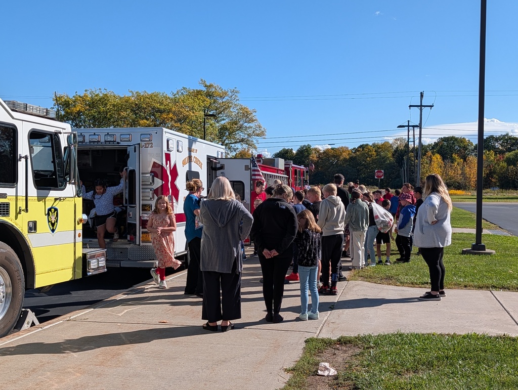 Students outside with fire trucks