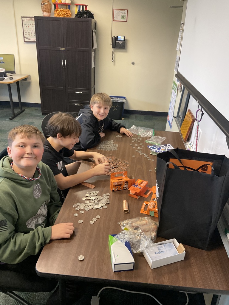 students counting coins