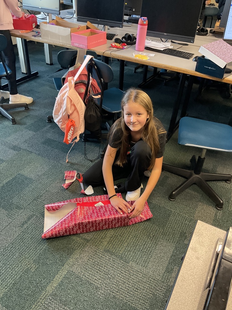 student wrapping box