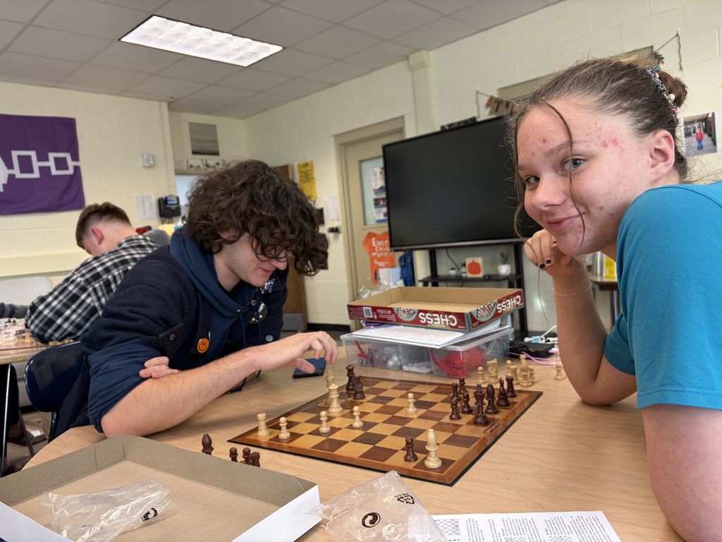 Chess club playing game 2 players