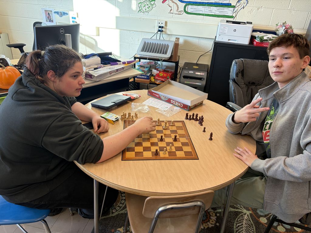 Chess club playing game 2 players