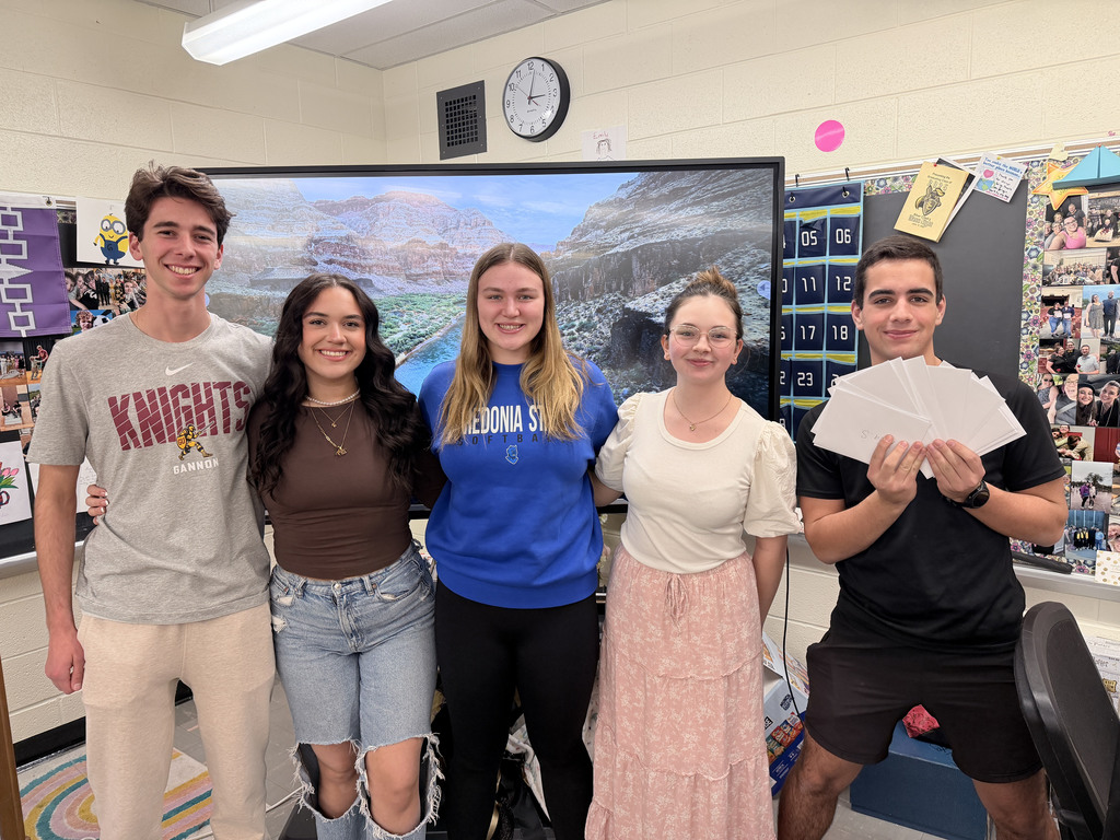 5 NHS seniors holding greeting cards