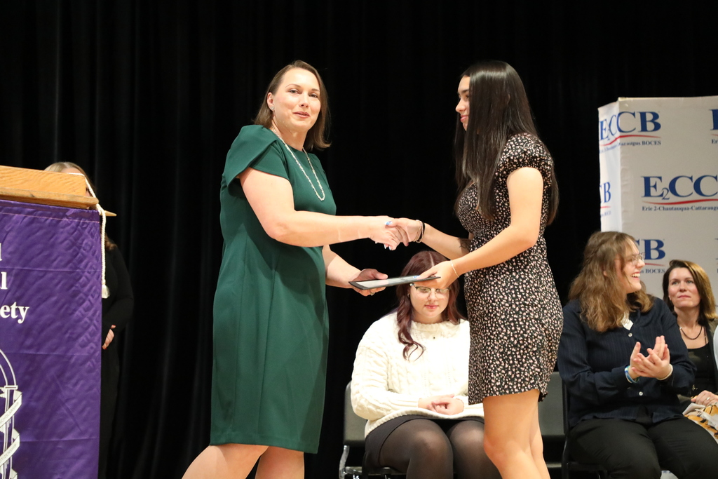 Ryleigh Hanner receiving certificate