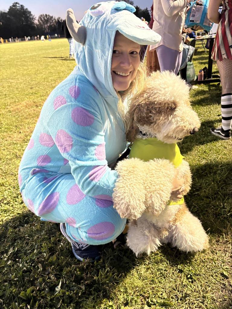 Mrs. Cook & Tucker dressed up as monsters for Halloween