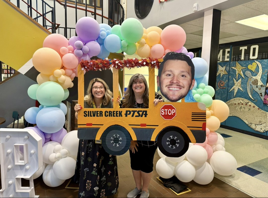 Schar & Meagan in school bus cut out frame