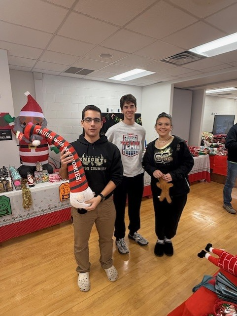 Cross Bowers Salisbury posing with gnome toy