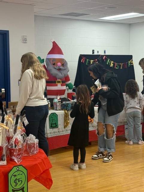 girls looking at gift items