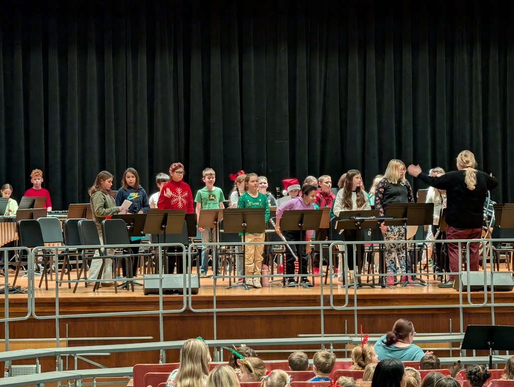 Band standing on stage