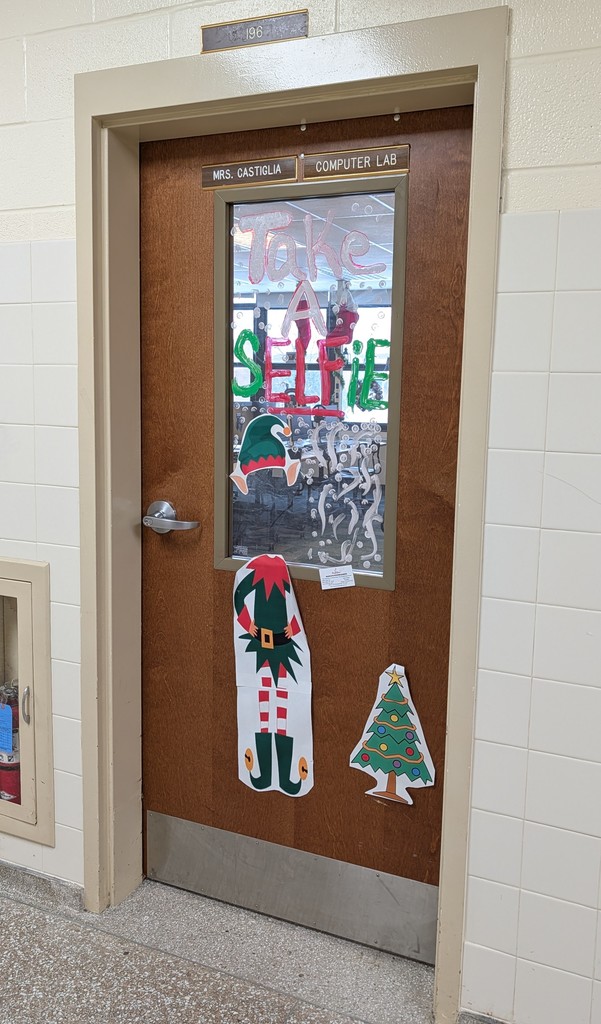 Door decorated with elf and trees