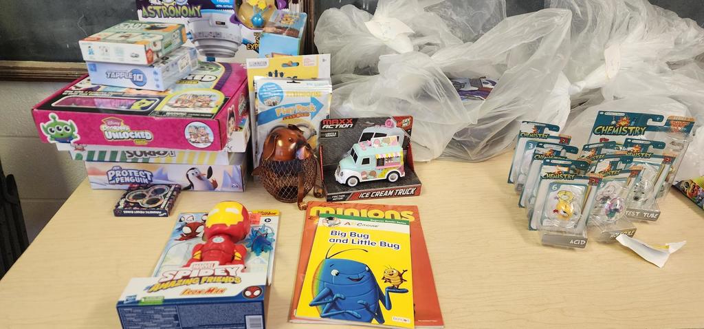 Close up of toy table showing books, games and puzzles
