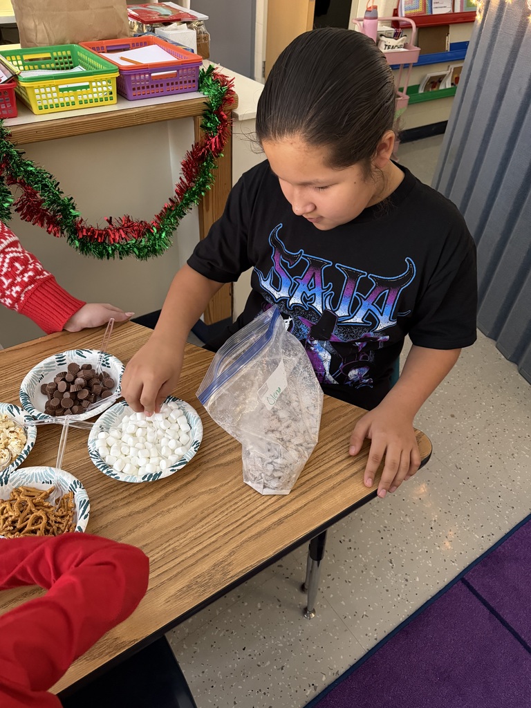 boy picking up marshmallows