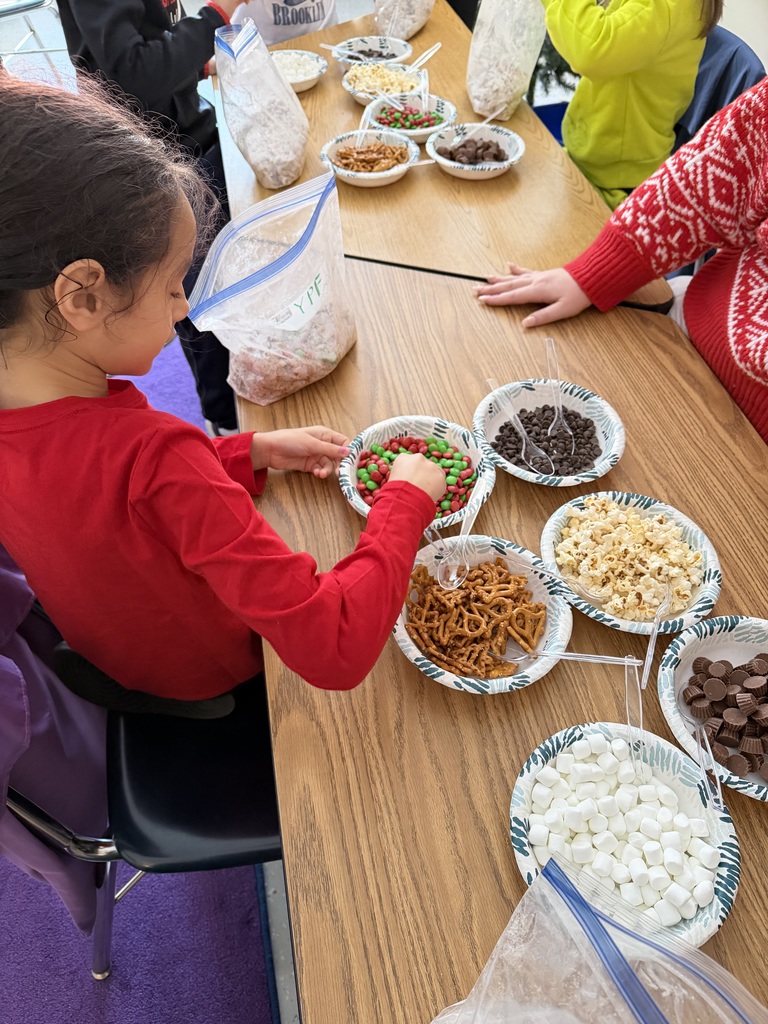 child choosing mix ingredients