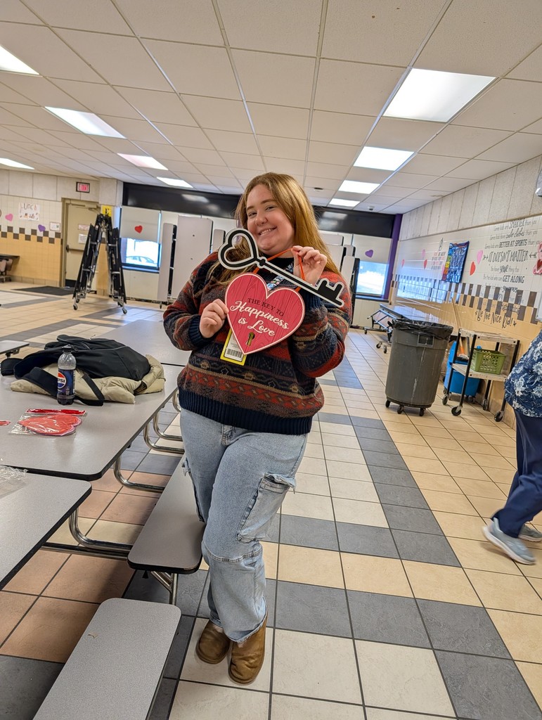 Savannah holding a heart decoration