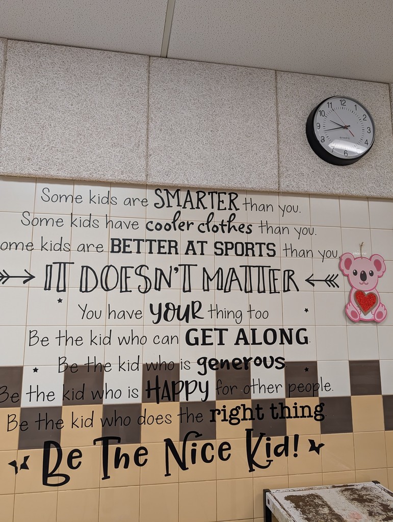 Teddy bear with heart decor by "be a nice kid" quote