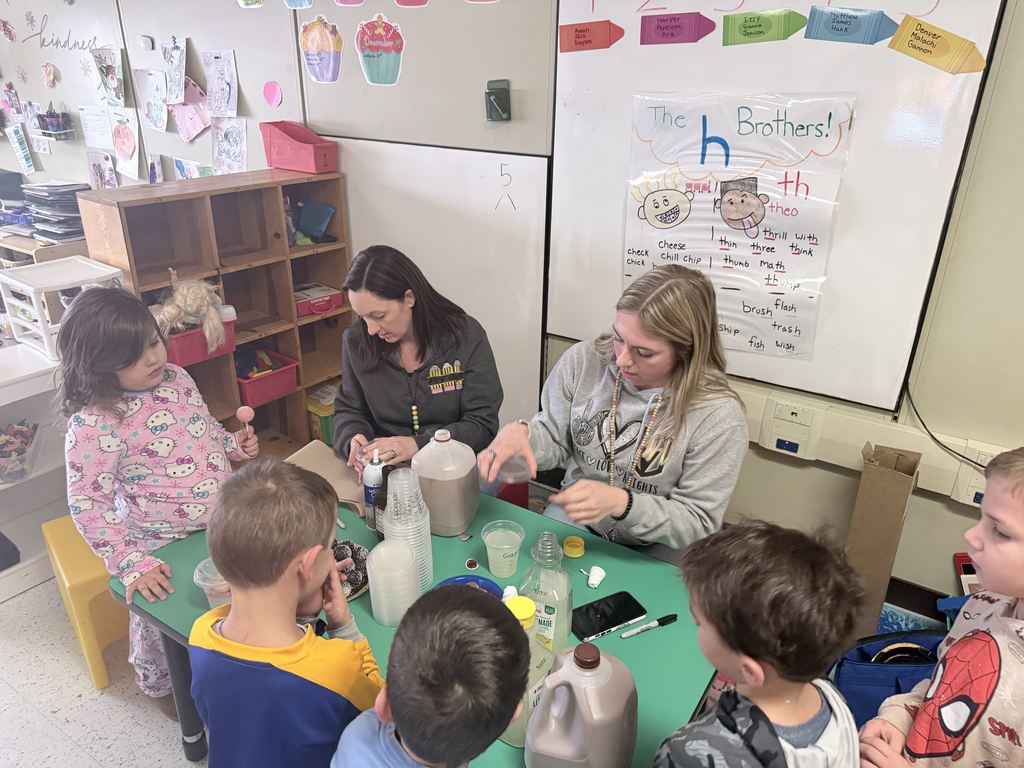 students at table with snacks