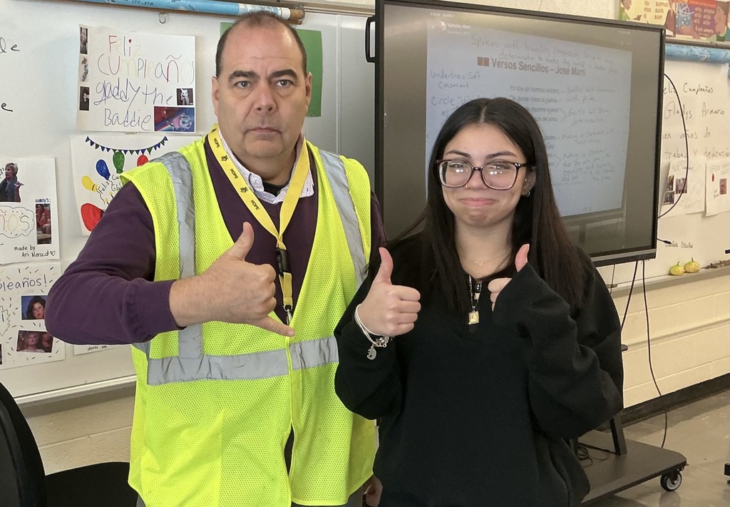 Mr. VanDette with female high school student