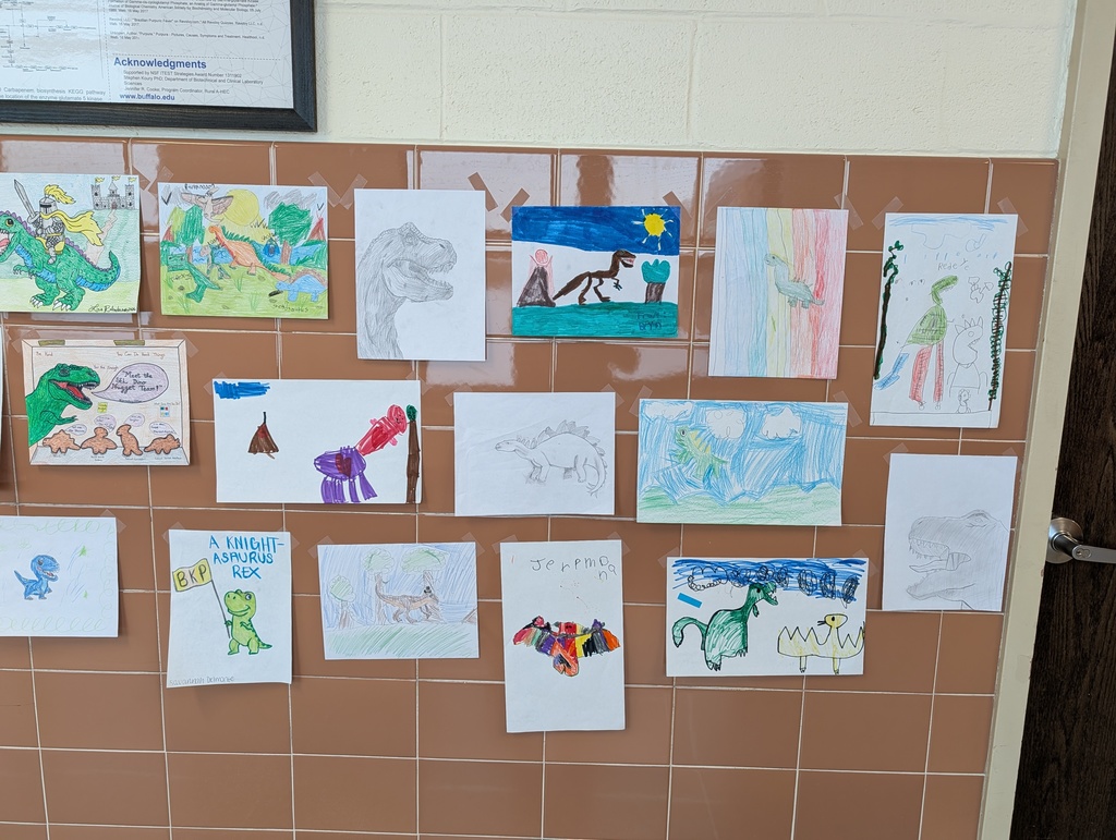 gallery of dinosaur drawings in hallway