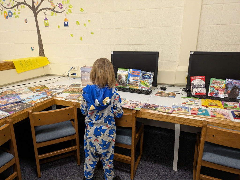 Student browsing books in the library