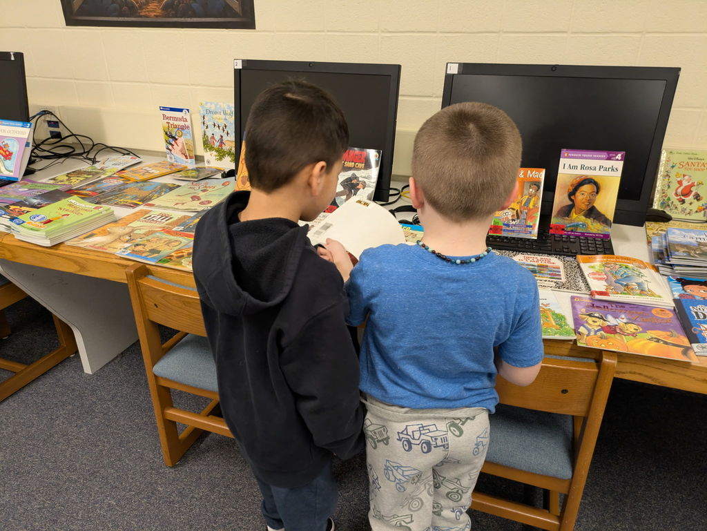 Students browsing books in the library