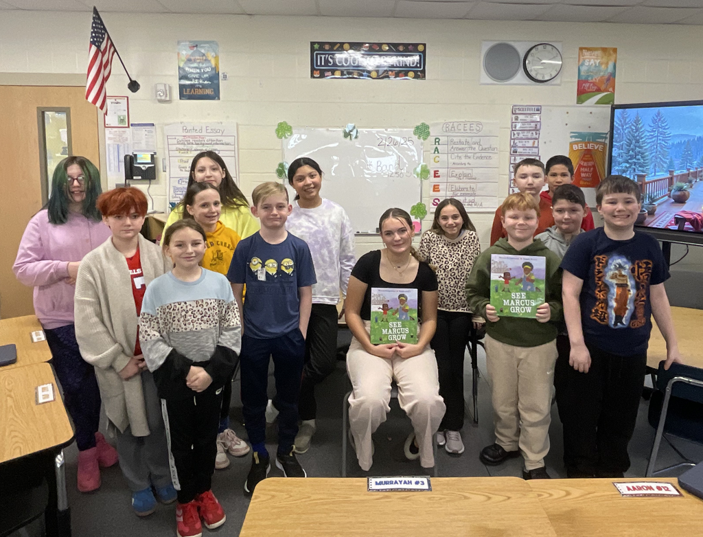 Lexi reads to Ms. Smith's class.