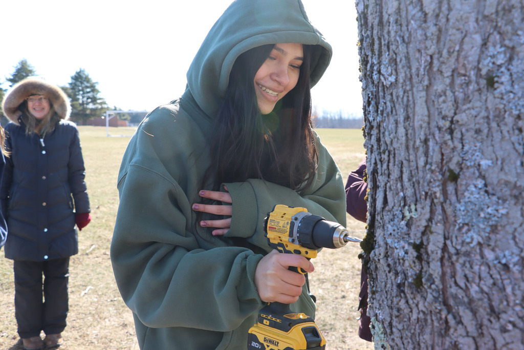 student drills the tap hole. 