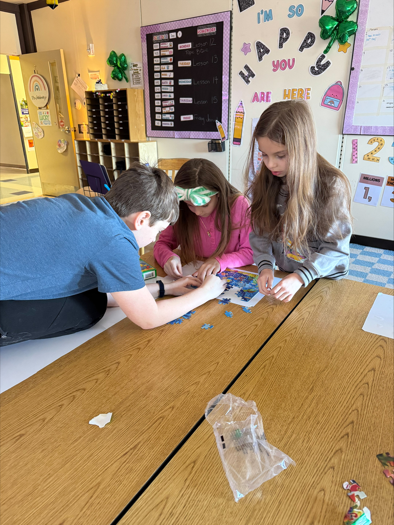 Students working on their puzzle