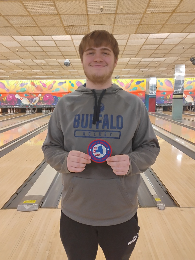 Calvin Matney holding his award