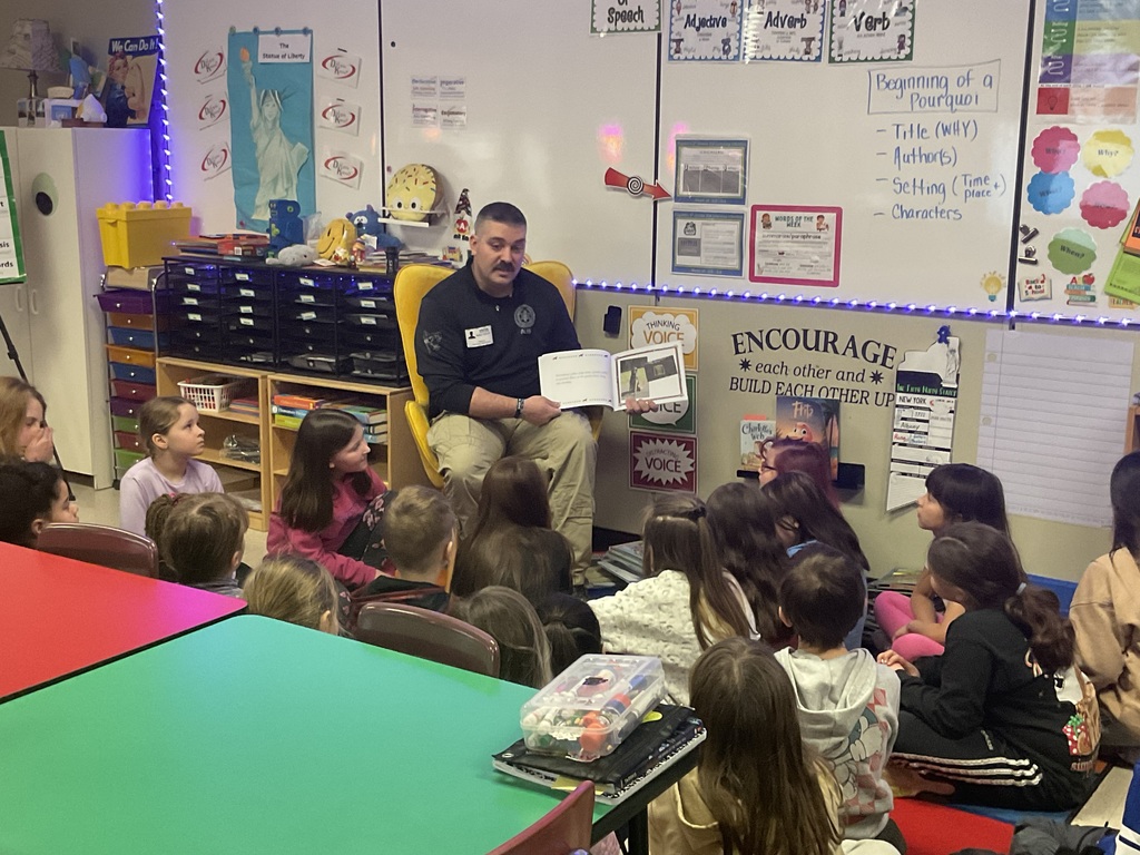 Sgt. G reads to the class. 
