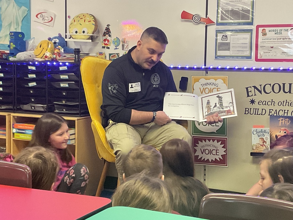 Sgt. G reads to the class. 