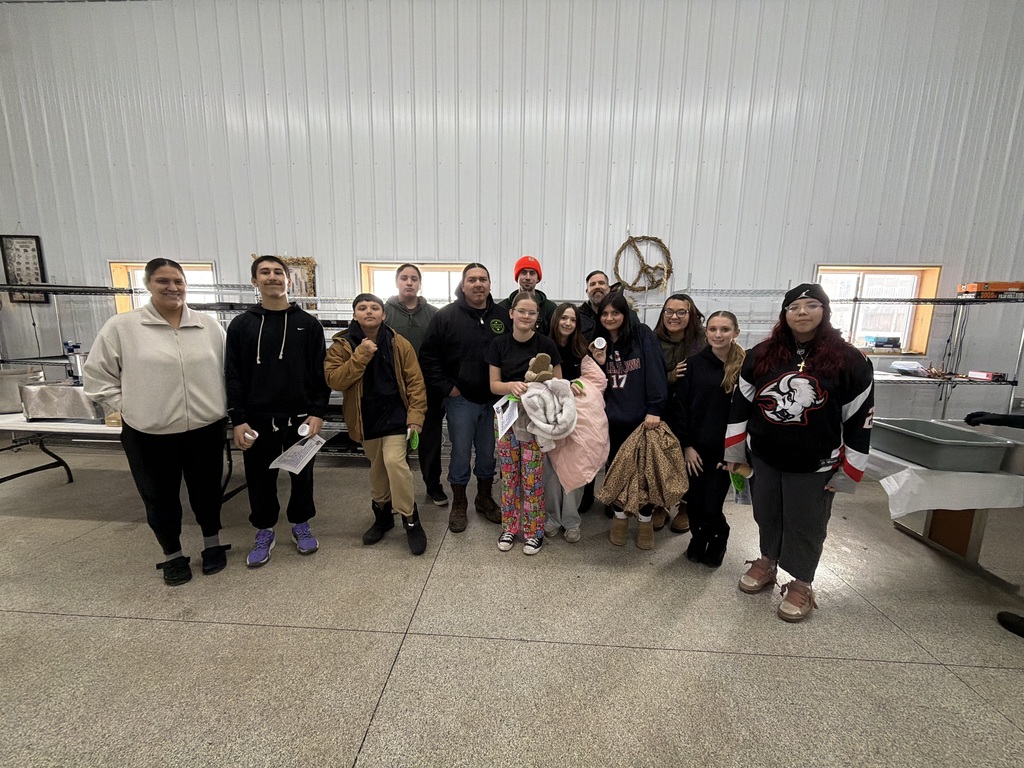 Students and teachers posing in group photo