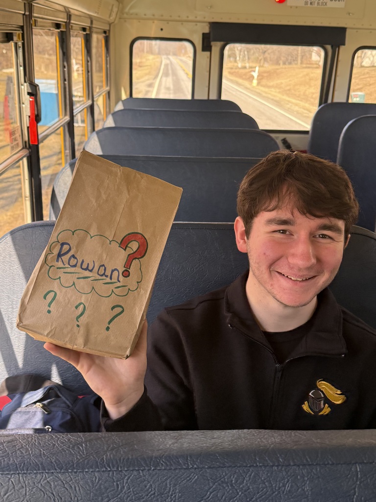 student with a quiz pack