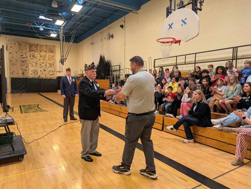 Mr. Case accepts an appreciation plaque. 