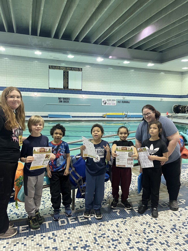 elementary students on the pool deck