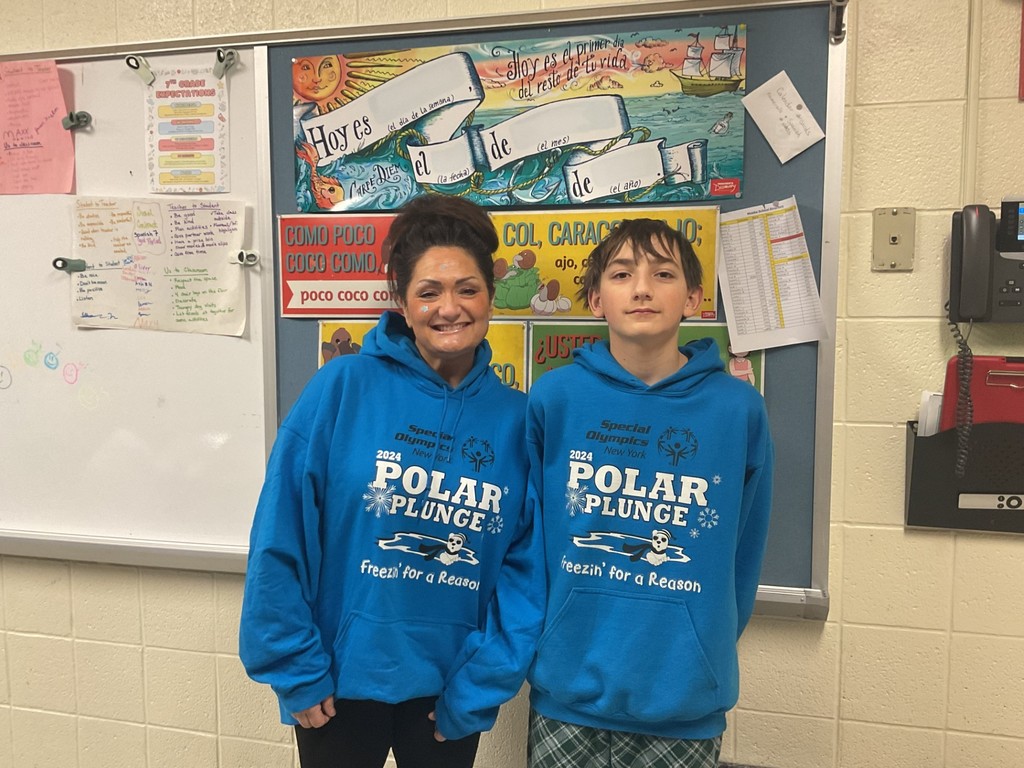 Mrs. Prinzbach and a student twin in blue hoodies