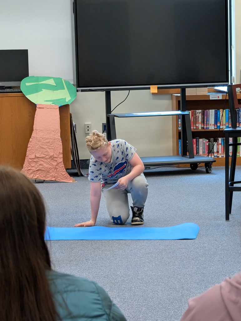 Students in costume acting out Greek plays