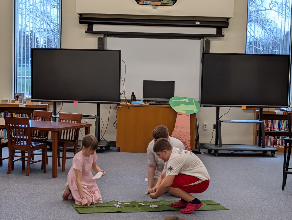 Students in costume acting out Greek plays