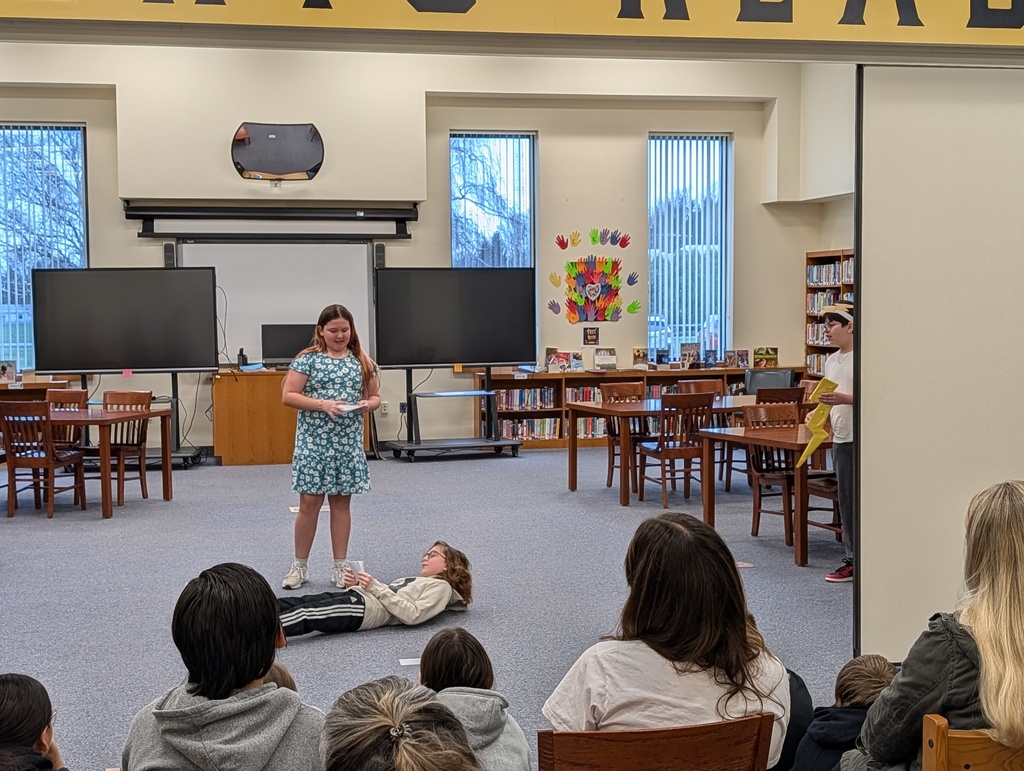 Students in costume acting out Greek plays