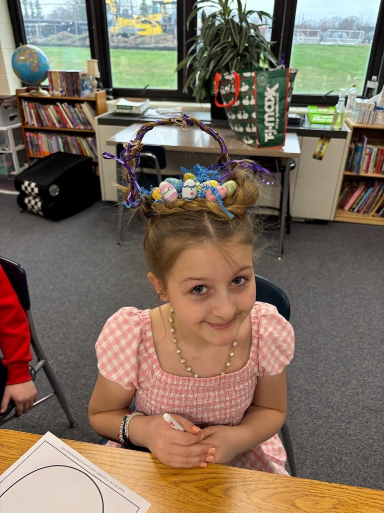 Girl in pink dress with hair styled like an Easter basket