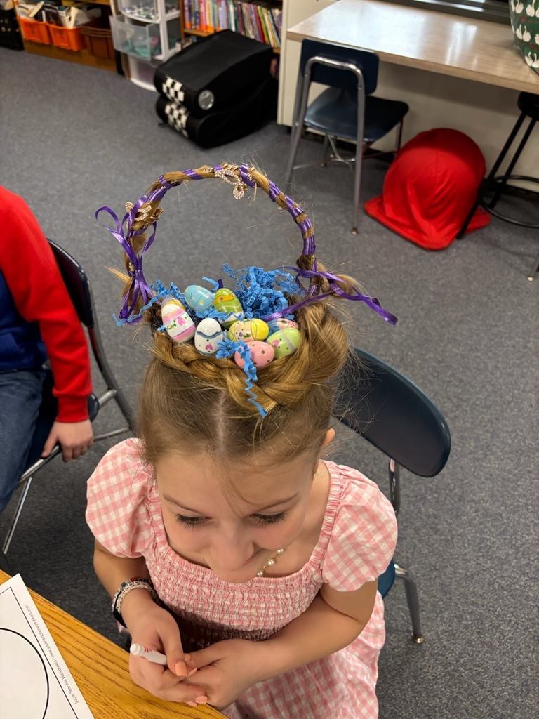 Girl in pink dress with hair styled like an Easter basket