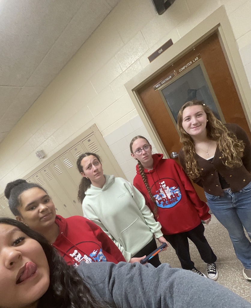 Students pose in the hall