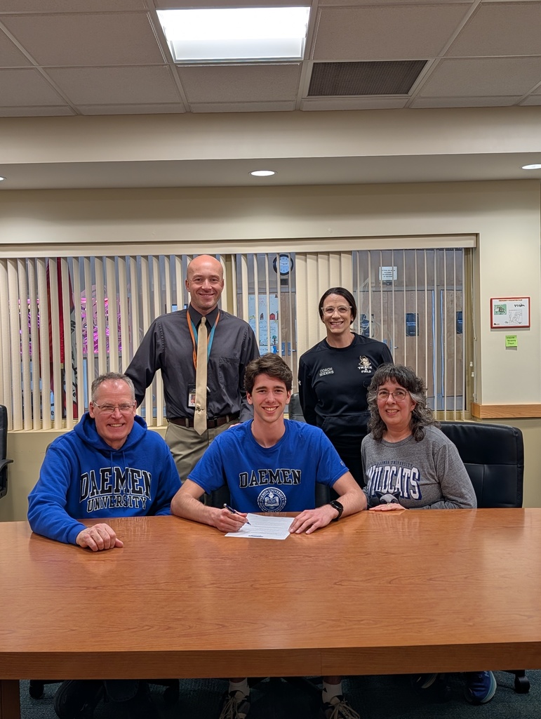 Sam with parents and coaches