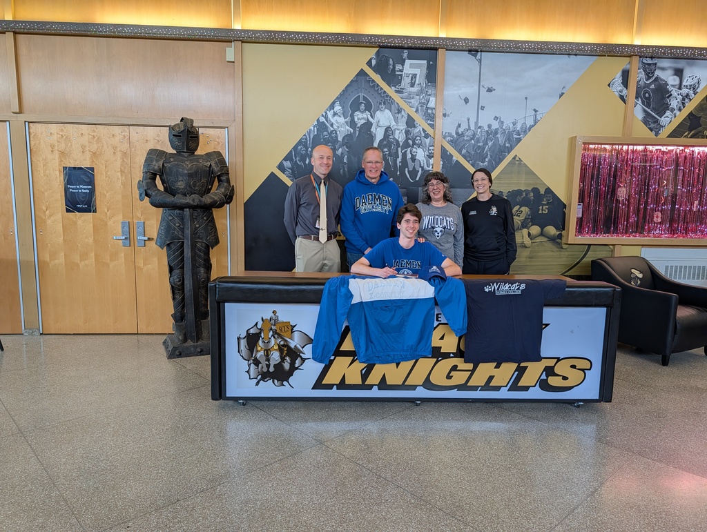 Sam with parents and coaches