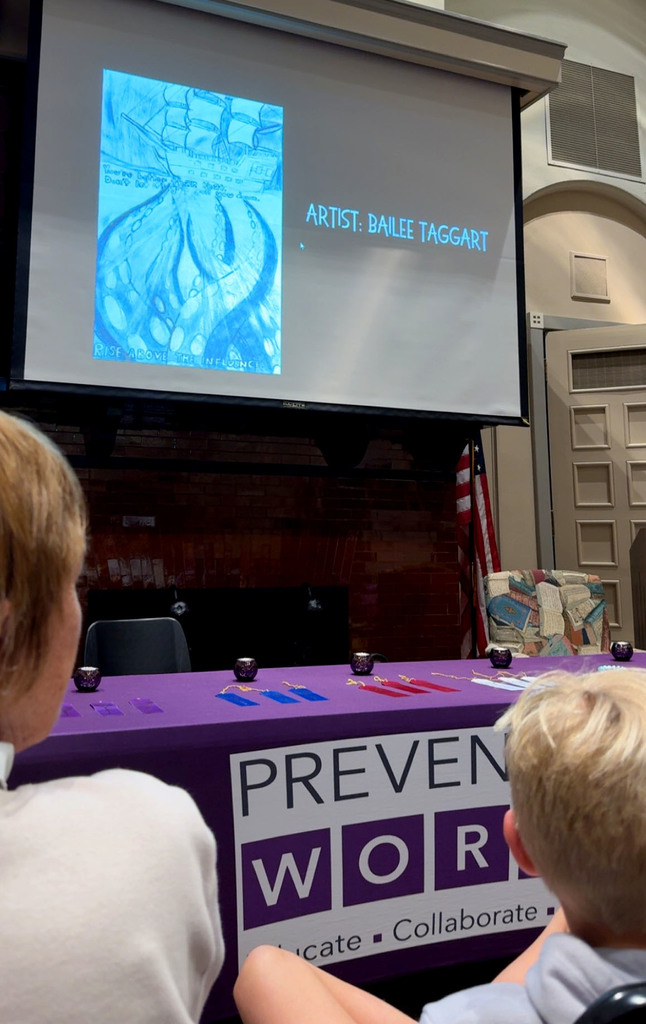 Poster design shown on screen 