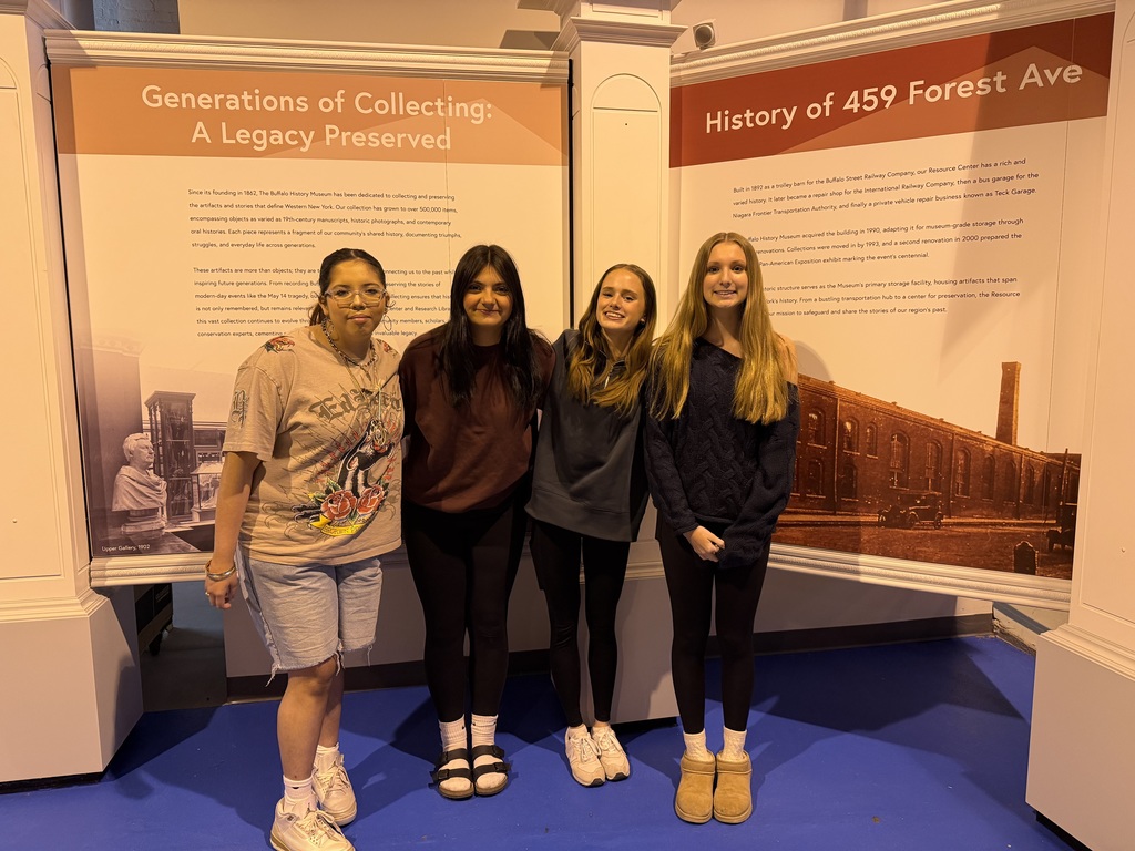 Four students in the museum.