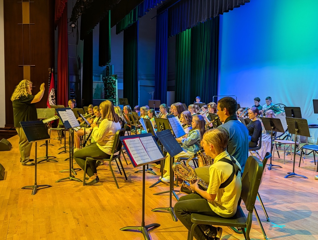 Ms. Bachowski directing band on stage