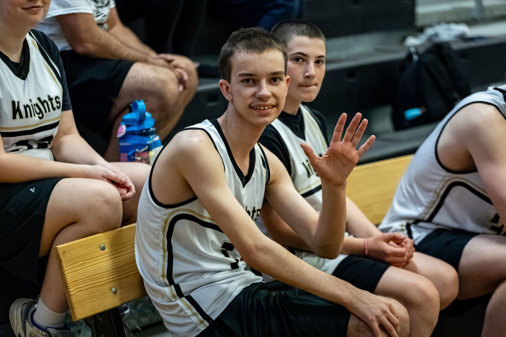 SC players wave from the sidelines