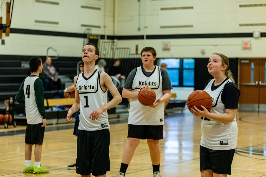 SC players prepare to shoot baskets
